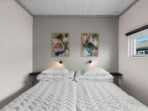 Ένα ή περισσότερα κρεβάτια σε δωμάτιο στο Apartment Asfrid - 80m from the sea by Interhome