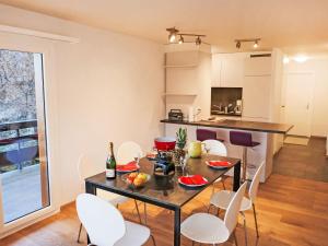 a kitchen and dining room with a table and chairs at Apartment Bietschorn 33 by Interhome in Nendaz
