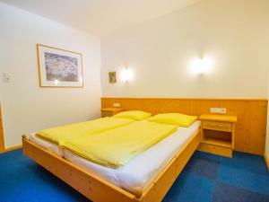 Voodi või voodid majutusasutuse Holiday Home Am Weitfeld-1 by Interhome toas