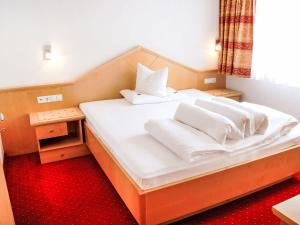 Ένα ή περισσότερα κρεβάτια σε δωμάτιο στο Apartment Falkner-14 by Interhome