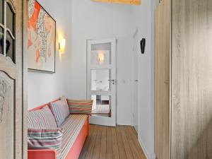 a living room with a couch and a hallway at Holiday Home Lanica - 150m from the sea by Interhome in Dalby +13 photos