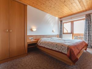 Ένα ή περισσότερα κρεβάτια σε δωμάτιο στο Apartment Voithofer-6 by Interhome