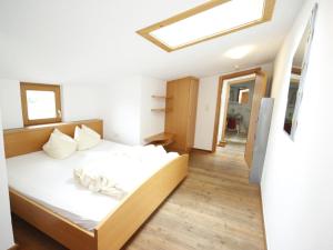 Ένα ή περισσότερα κρεβάτια σε δωμάτιο στο Apartment Falkner-9 by Interhome