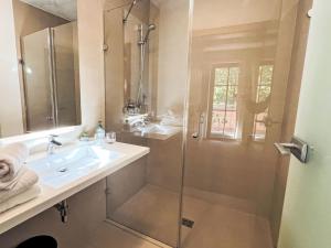 a bathroom with a shower and a sink and a shower at Apartment Cheeky Apartment-3 by Interhome in Oberndorf in Tirol