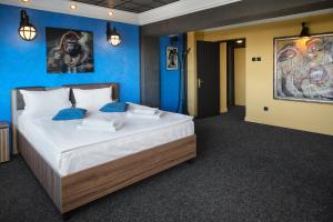 En eller flere senge i et værelse på Lapusneanu Central Apartments