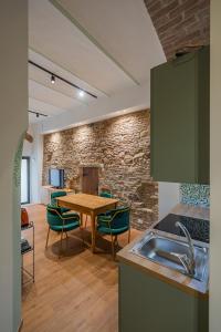 Η κουζίνα ή μικρή κουζίνα στο Via della Sposa 35 - ideale per 2 perfetto per 4