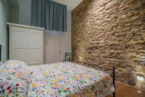 Ένα ή περισσότερα κρεβάτια σε δωμάτιο στο Via della Sposa 35 - ideale per 2 perfetto per 4