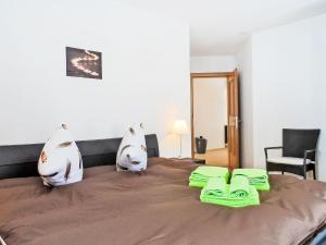 Ένα ή περισσότερα κρεβάτια σε δωμάτιο στο Apartment A11 by Interhome