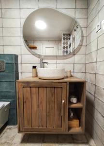 a bathroom with a sink and a mirror at Light Blue Apartment Orihuela Costa in Orihuela Costa