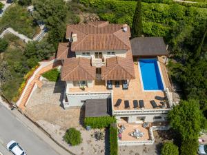 an aerial view of a house with a swimming pool at Holiday Home Belle vue by Interhome in Palau-Saverdera