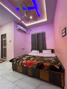 Postel nebo postele na pokoji v ubytování Hotel Glorious Inn