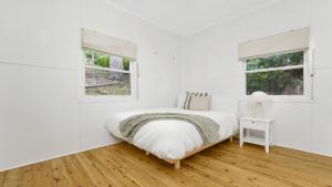 Ένα ή περισσότερα κρεβάτια σε δωμάτιο στο Arden Retreat