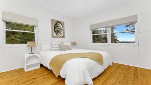 Ένα ή περισσότερα κρεβάτια σε δωμάτιο στο Arden Retreat