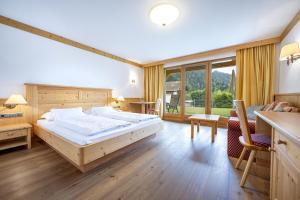 Ένα ή περισσότερα κρεβάτια σε δωμάτιο στο Residence Peter