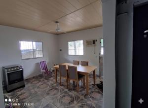 a dining room with a table and chairs at Casa Mar in Serra