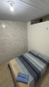 Postel nebo postele na pokoji v ubytování Kitnet Próximo a Mercado São Brás, Rodoviária