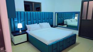 Postel nebo postele na pokoji v ubytování Jabulani Lodge