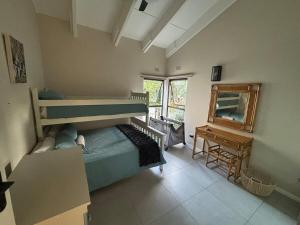 Ένα ή περισσότερα κρεβάτια σε δωμάτιο στο Ocean Gate House