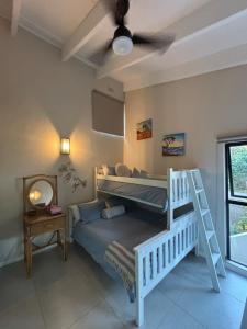 Ένα ή περισσότερα κρεβάτια σε δωμάτιο στο Ocean Gate House