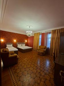 Ένα ή περισσότερα κρεβάτια σε δωμάτιο στο Hôtel Jeanne d'Arc Central