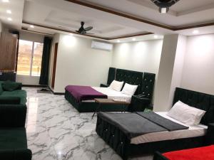 Posezení v ubytování Hotel Royal Inn