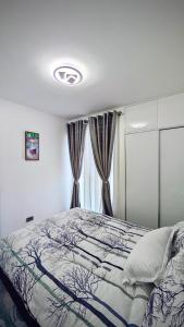 Ένα ή περισσότερα κρεβάτια σε δωμάτιο στο Mimi homes