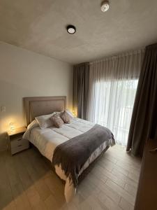 Giường trong phòng chung tại Tannat Soho +47 ảnh