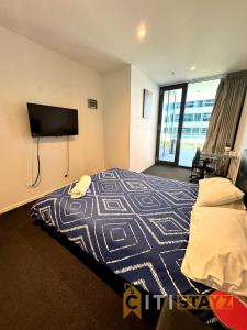 Postel nebo postele na pokoji v ubytování Perfectly Located Modern Apartment - Canberra CBD