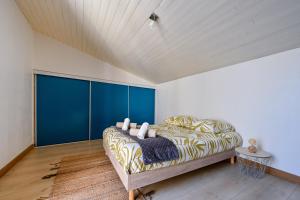 Ένα ή περισσότερα κρεβάτια σε δωμάτιο στο Keranam - Centre du Guérande