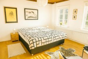 Postel nebo postele na pokoji v ubytování GBH - Central Townhouse in Skagen