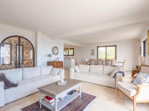 Posezení v ubytování Villa Odyssee by Interhome