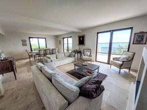 Posezení v ubytování Villa Odyssee by Interhome