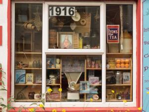 a window of a store with items in it at Holiday Home Spanish Cove - TR4 D4 - Sleeps 5 by Interhome in Kilkee