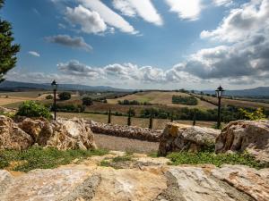 a view of the rolling hills and rocks at Holiday Home Poggio Piero 2 by Interhome in Montemassi