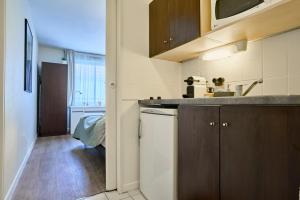 Η κουζίνα ή μικρή κουζίνα στο Elegant and cozy Vauban studio +21 φωτογραφίες