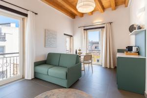 Kuchyň nebo kuchyňský kout v ubytování Hotiday Apartments Siracusa