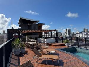 Balkón nebo terasa v ubytování Flat beira-mar pé na areia com varanda