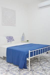 Giường trong phòng chung tại DallaVi rooms