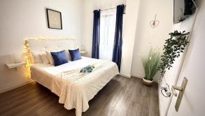 Ένα ή περισσότερα κρεβάτια σε δωμάτιο στο Nacar Golden Sand Beach by Deihu Experiences