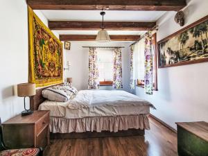 a bedroom with a bed and a window at Apartment Kalina by Interhome in Stoczek