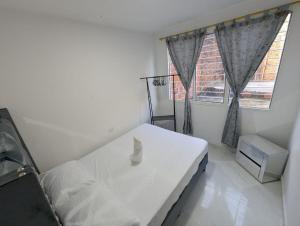 Postel nebo postele na pokoji v ubytování KINGDAVID HOSTEL-2do piso