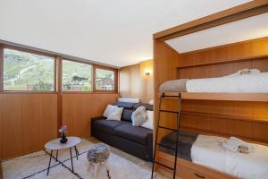 Postel nebo postele na pokoji v ubytování Bardoney Ski Lodge + 10 fotografií