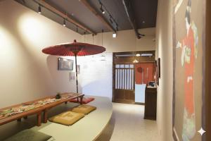 Posezení v ubytování Kimono Hotel Himeji 着物宿 + 44 fotografií