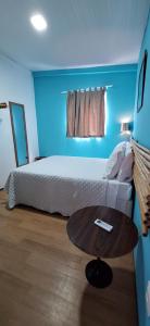 Postel nebo postele na pokoji v ubytování Vida de Ilha