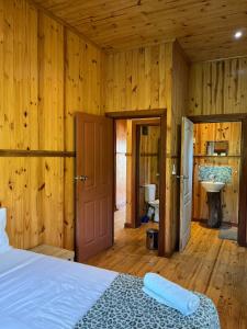 Ένα ή περισσότερα κρεβάτια σε δωμάτιο στο Onda Azul Main House +22 φωτογραφίες