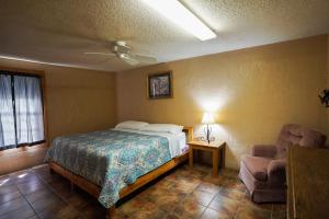 Un ou plusieurs lits dans un hébergement de l'établissement Cypress Villa 1