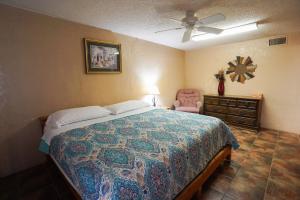 Un ou plusieurs lits dans un hébergement de l'établissement Cypress Villa 1