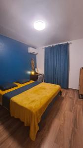 En eller flere senge i et værelse på T3 Les Alizées