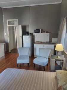 Giường trong phòng chung tại Carmen