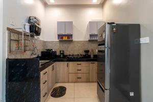 Kuchyň nebo kuchyňský kout v ubytování AQUA VERDE- 3 Bedroom Townhouse wd Pvt Pool & Terrace